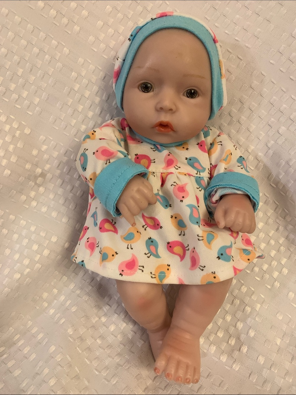 10 inch vinyl realistic looking baby doll, anatomically correct girl baby.
